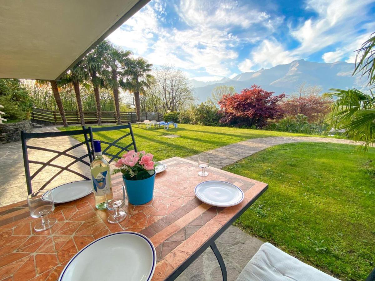Bellavista A Garten Appartement Mit Pool Colico Bagian luar foto